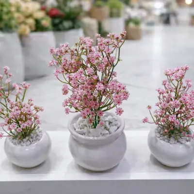 Composition décorative florale artificielle rose avec pots design