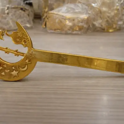 Cuillère décorative dorée lune et étoiles – Accessoire élégant pour service et décoration